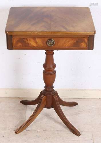 Small English regency-style mahogany sewing table.