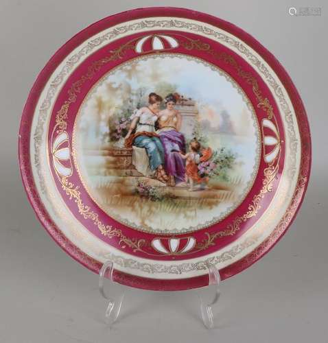 Antique porcelain decorative dish with Viennese decor.