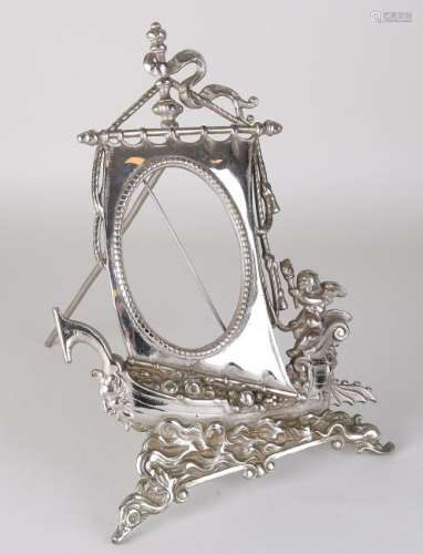 Antique nickel-plated brass photo frame with standard.