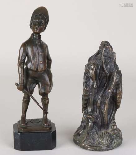 Two bronze figures. 21st century. Consisting of: Three