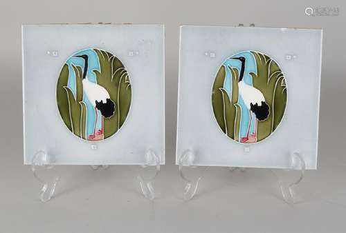 Two antique German Jugendstil wall tiles with storks.