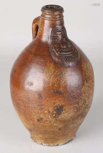 18th century German stoneware beard man jug with brown