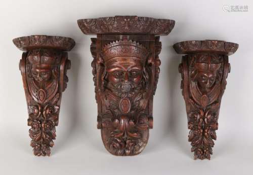 Three oak carved wall brackets. Arab men with heads.