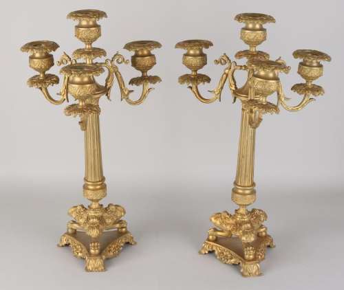 Two 19th century bronze Charles Dix candle holders.