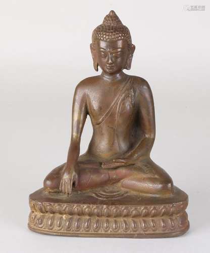 Ancient Oriental seated bronze Buddha figure on lotus