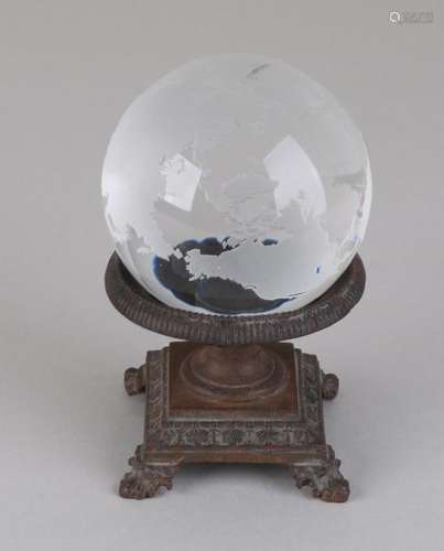 Glass etched globe on cast iron base. 20th century.