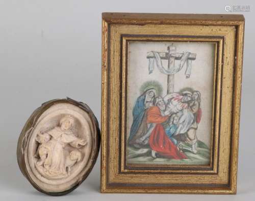 Twice religious antiques. Consisting of: Meerschaum