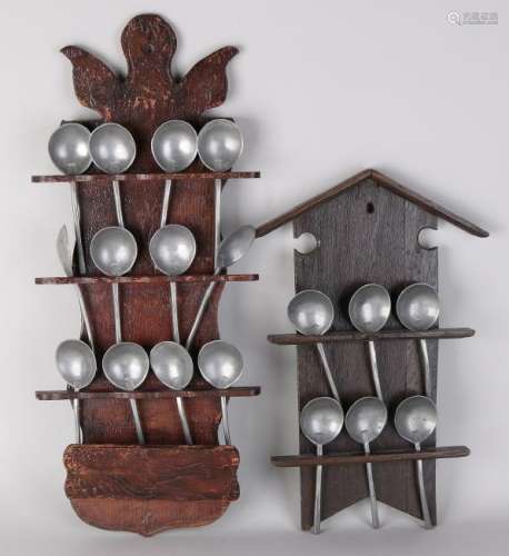 Two 19th century Dutch spoon racks with pewter spoons.