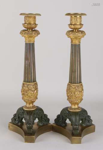 Two antique 19th century bronze Empire candle holders