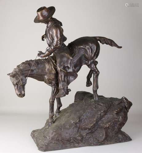 Very large bronze figure. To Remmington. Cowboy. 21st