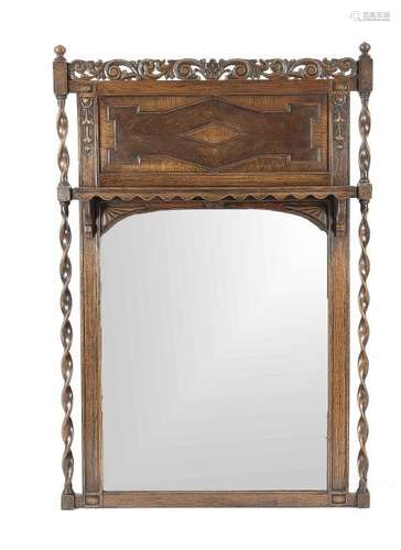 Antique English oak carved mirror with twisted columns.