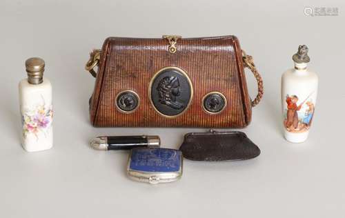 Antique leather ladies handbag with medallions and two