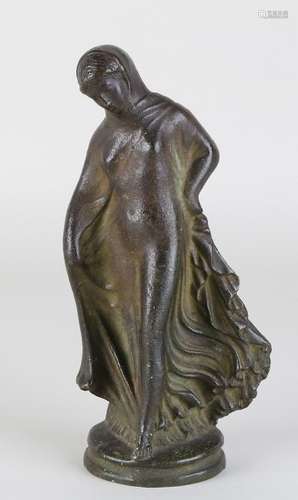 Antique bronze figure. Naked lady with robe. Circa