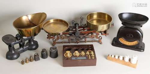 Three antique scales with weights, diverse. Consisting