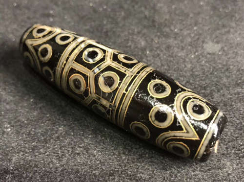 A TIBETAN GILDED THIRTYSIX EYES DZI