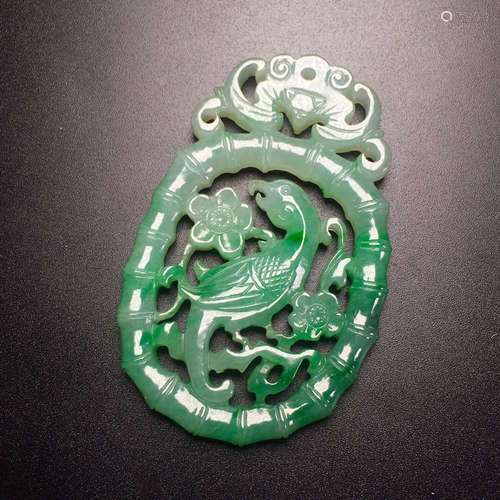 A JADEITE CARVED AUSPICIOUS PATTERN PENDANT