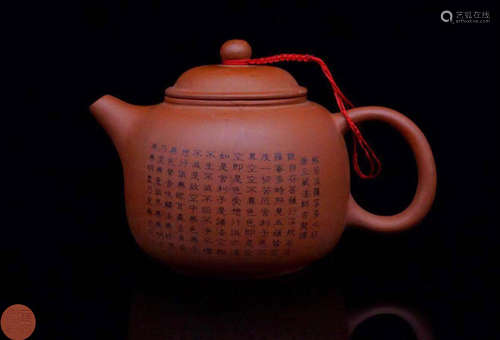 A ZISHA CARVED POETRY PATTERN TEA POT