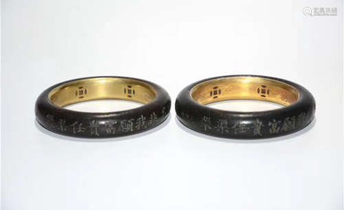 A CHENXIANG WOOD GILT SILVER DECORATED BANGLE