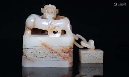 A HETIAN JADE CARVED DRAGON SHAPED SEAL