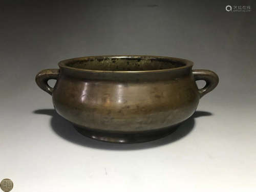 A BRONZE CASTED DOUBLE EAR CENSER