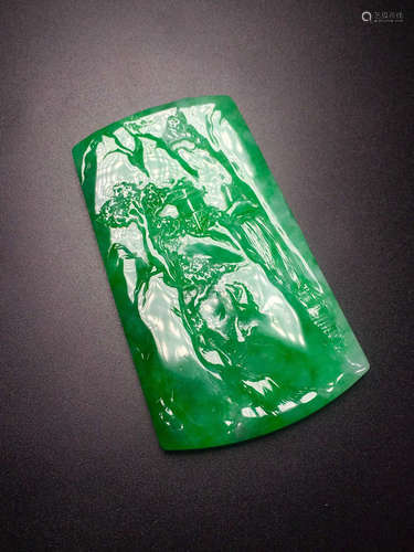 A GREEN JADEITE CARVED LANDSCAPE PATTERN PENDANT