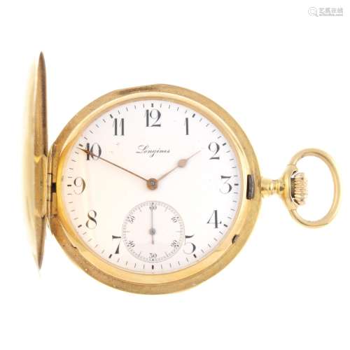 A full hunter pocket watch by Longines.