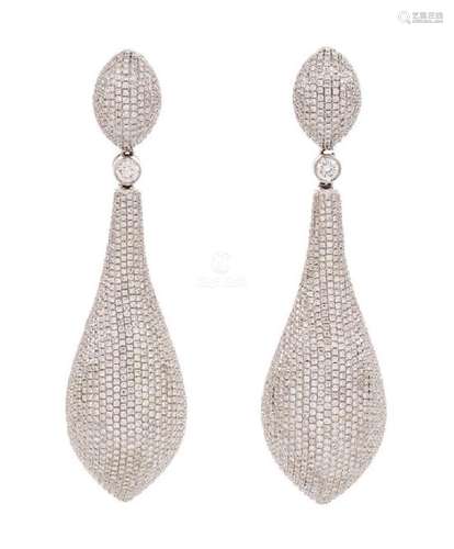 A Pair of 18 Karat White Gold and Diamond Earclips,