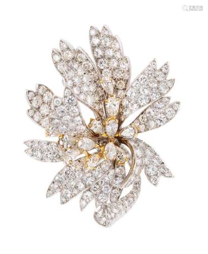 A Platinum, Yellow Gold and Diamond Flower