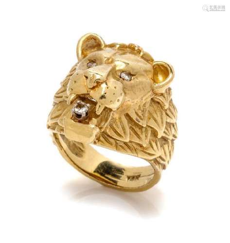 * A 14 Karat Yellow Gold and Diamond Lion Motif Ring,