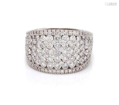 * An 18 Karat White Gold and Diamond Ring, 16.30 dwts.