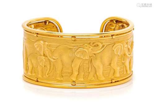 * An 18 Karat Yellow Gold Elephant Motif Cuff Bracelet,