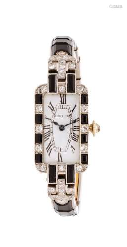 An Art Deco Platinum, Diamond and Onyx Wristwatch,