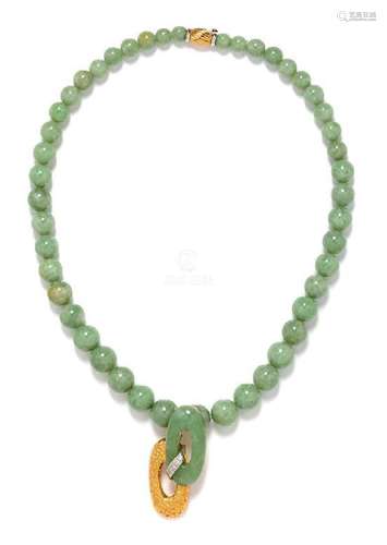 * An 18 Karat Yellow Gold, Jade and Diamond