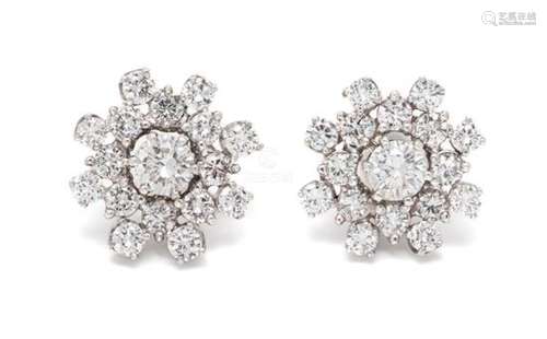 A Pair of White Gold and Diamond Stud Earrings and