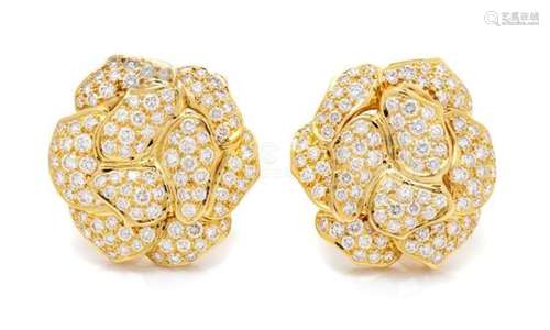 A Pair of 18 Karat Yellow Gold and Diamond Flower