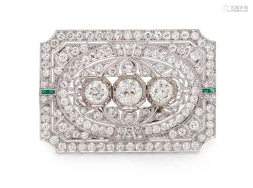 An Art Deco Platinum, Diamond, and Emerald Brooch, 9.30