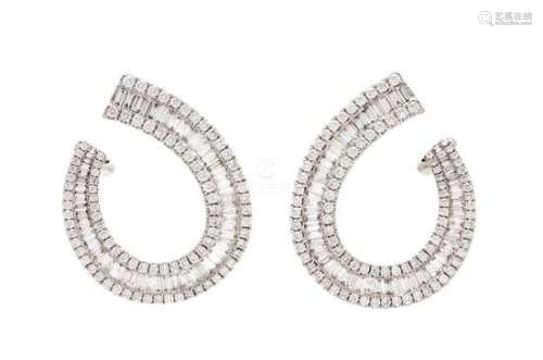 A Pair of 18 Karat White Gold and Diamond Earclips,