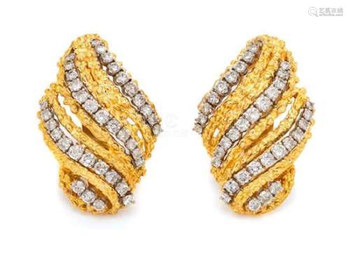 A Pair of 18 Karat Bicolor Gold and Diamond Earclips,