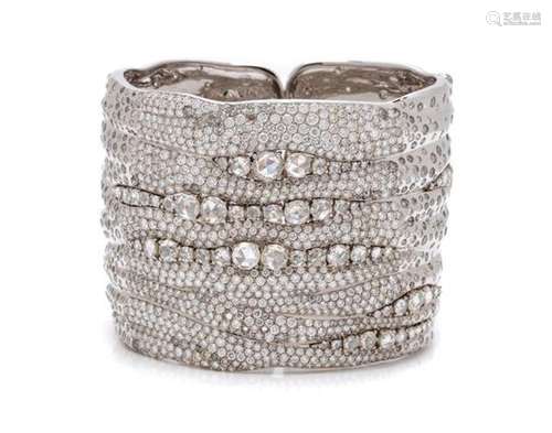 * An 18 Karat White Gold and Diamond Cuff Bracelet,