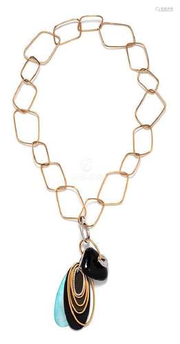 An 18 Karat Bicolor Gold, Diamond, Onyx,