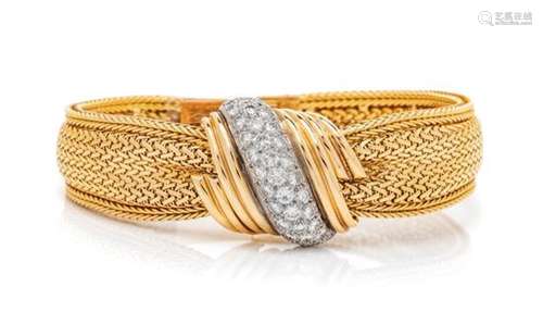 An 18 Karat Yellow Gold, Platinum and Diamond Surprise