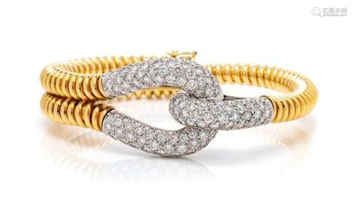 An 18 Karat Bicolor Gold and Diamond Bracelet,