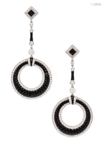 A Pair of 18 Karat White Gold, Diamond and Onyx