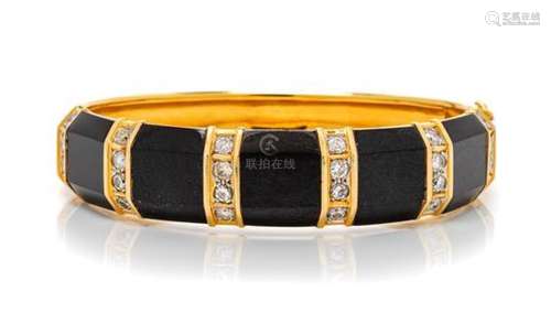 An 18 Karat Yellow Gold, Diamond and Onyx Bangle