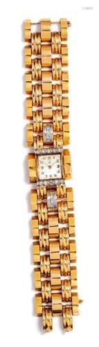 * A Retro 18 Karat Yellow Gold and Diamond Wristwatch,