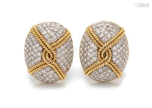 A Pair of Platinum, Yellow Gold and Diamond Earclips,