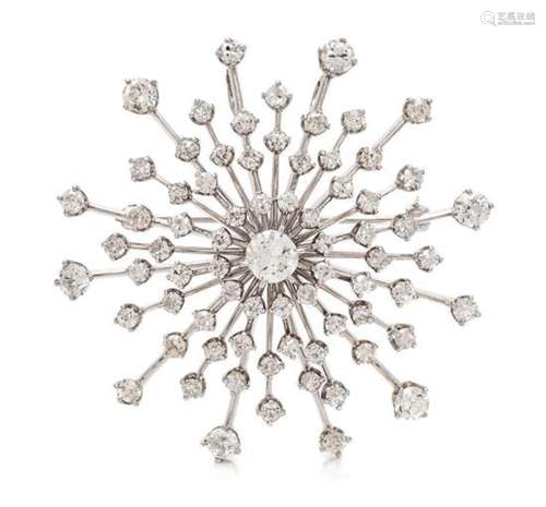 A Platinum, White Gold and Diamond Pendant/Brooch,