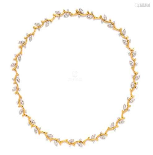 An 18 Karat Yellow Gold, Platinum and Diamond Vine