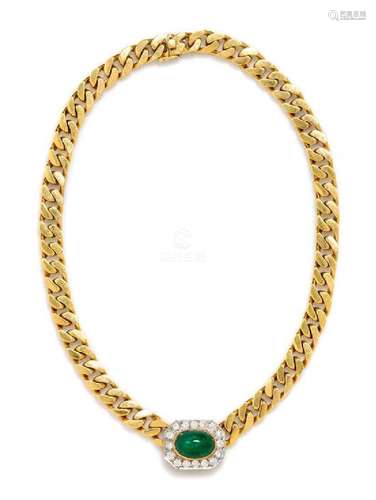 An 18 Karat Yellow Gold, Platinum, Emerald and Diamond