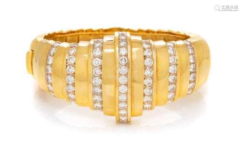 A Yellow Gold and Diamond Bangle Bracelet, 52.00 dwts.